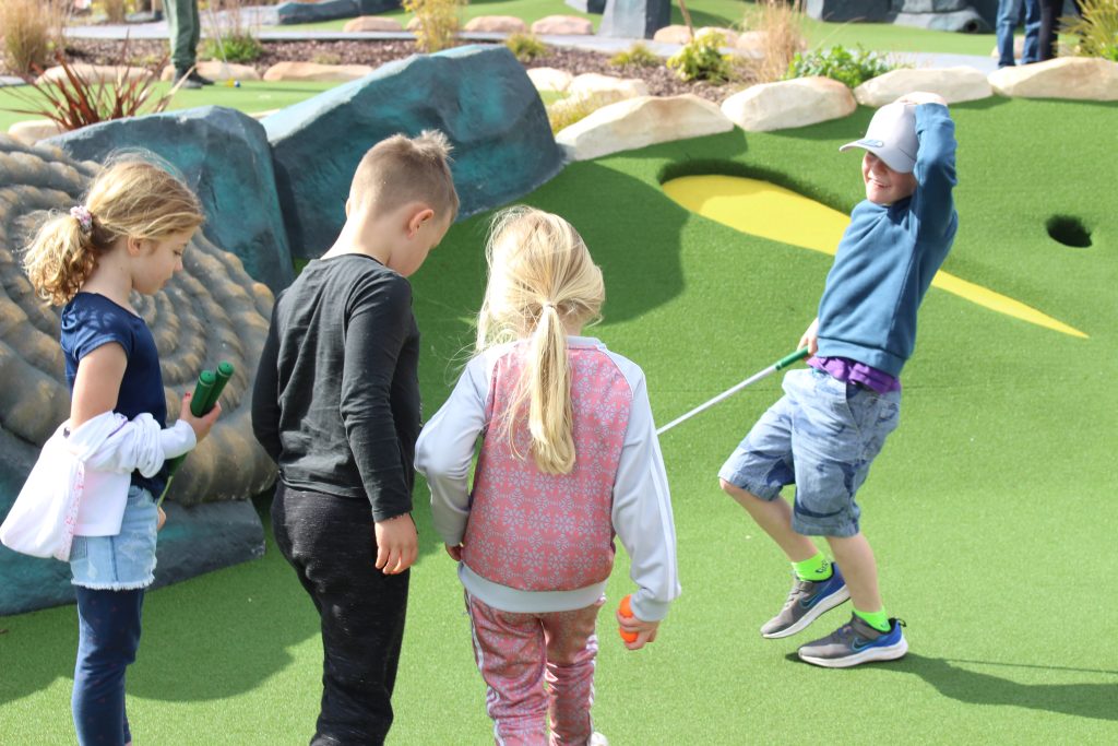 Kids having fun on a miniature course